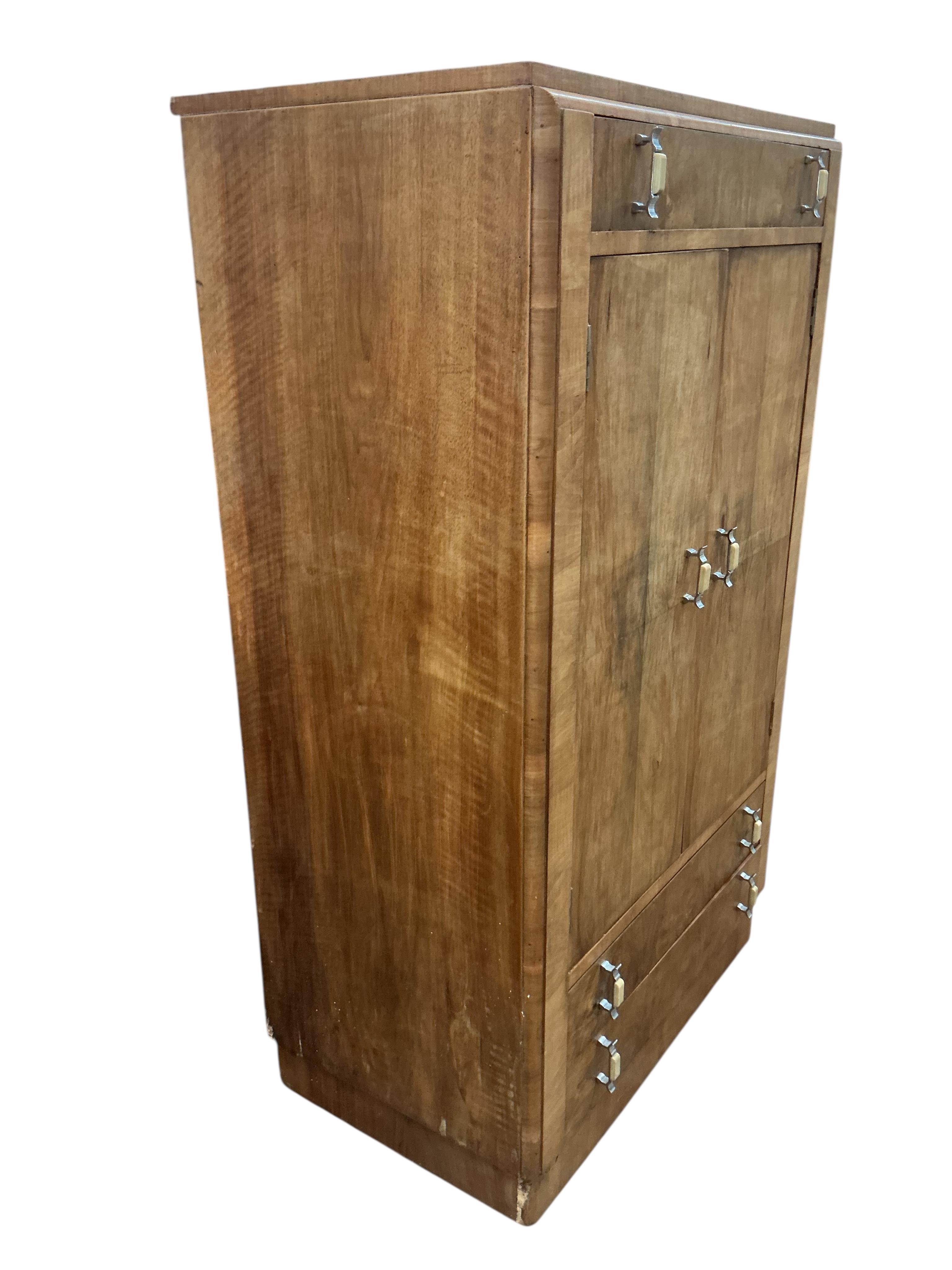 An Art Deco walnut gentleman's wardrobe, width 83cm, depth 49cm, height 140cm